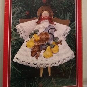 Handcrafted Bird Ornament with Pear Design